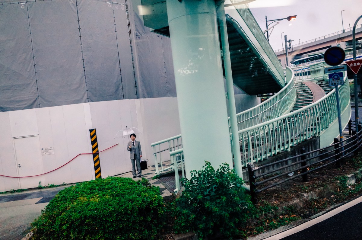 Man with umbrella, Kobe 9.11.13